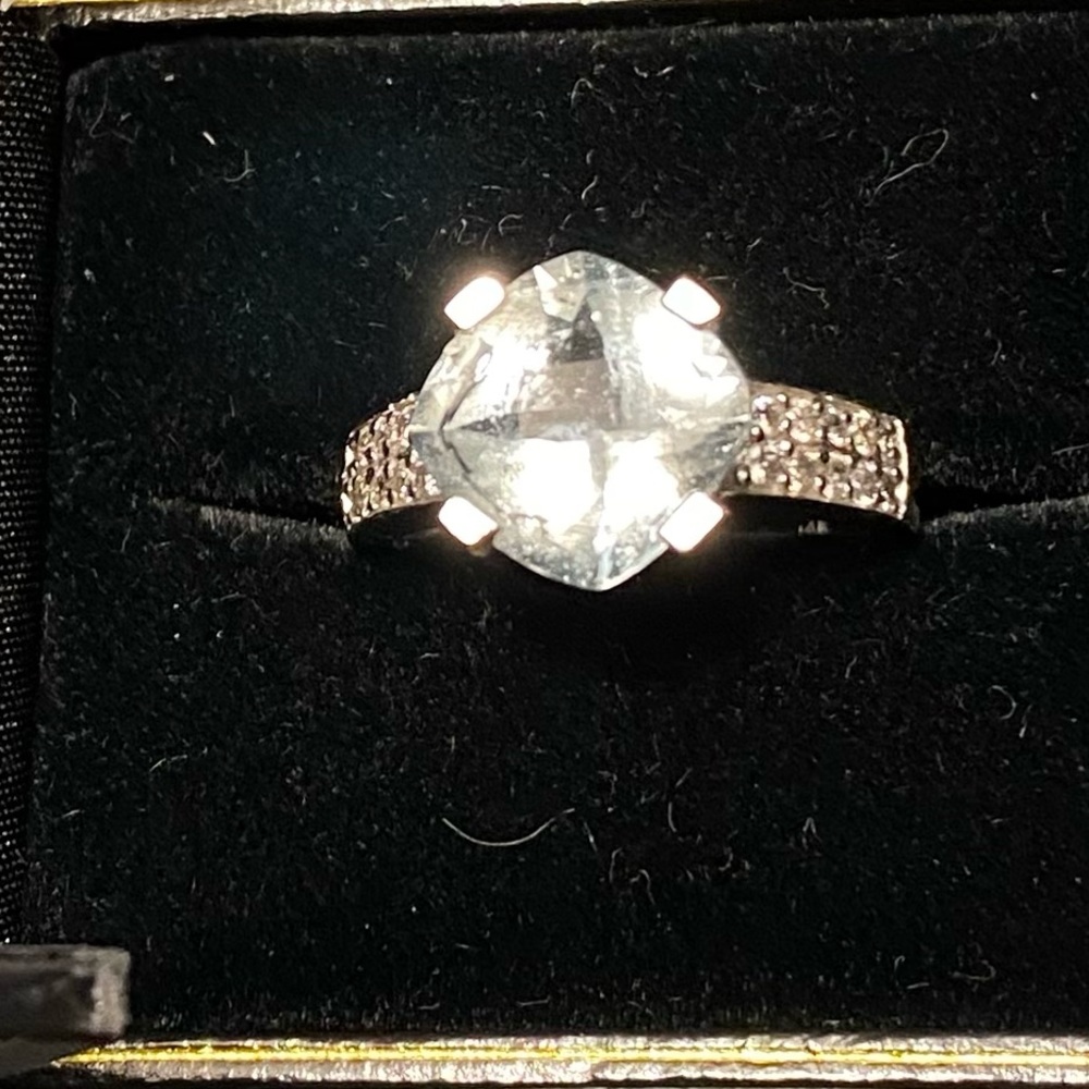 Aquamarine with diamond accents. Size 8